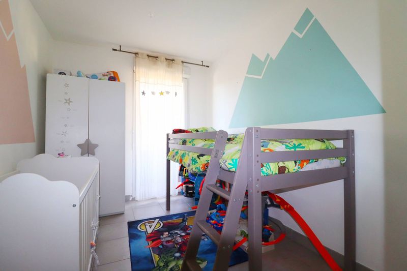 chambre enfant A louer appartement 3 pièces 57 m² avec terrasse, place de parking privative et garage La Batarelle 13013 Marseille